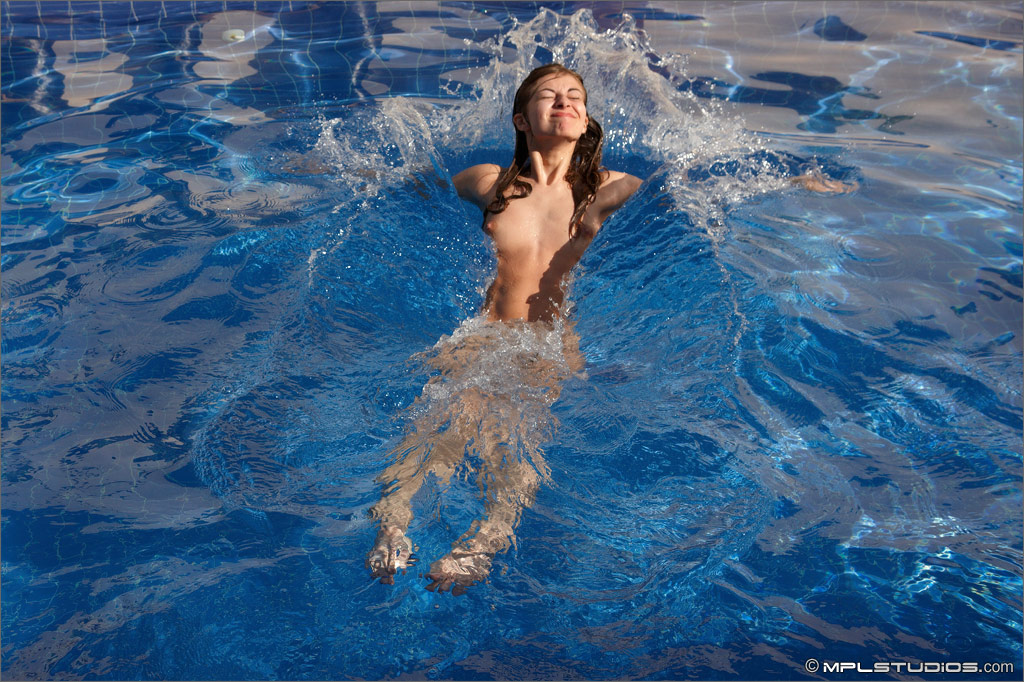 Photo #8 of Sasha posing in Relief from the Heat