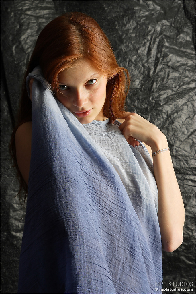 Photo #2 of Ava posing in Red Hot