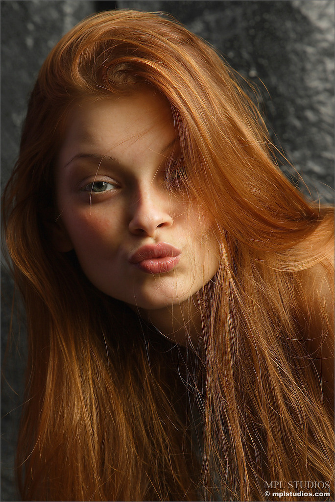 Photo #6 of Ava posing in Red Hot