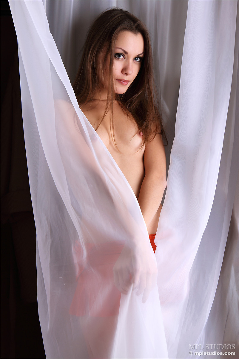 Photo #5 of Marta posing in Super Marta!