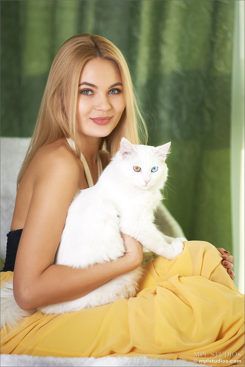 Photo #2 of Talia posing in Let the Sun Shine