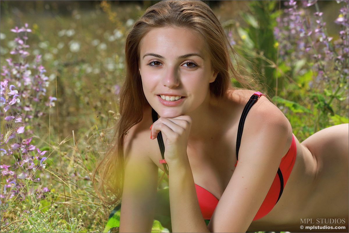 Photo #1 of Elle posing in A Field of Flowers