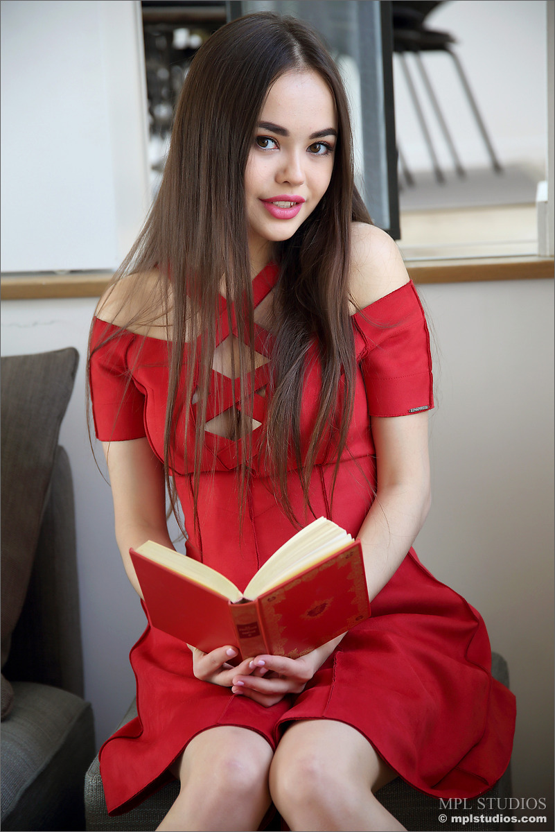 Photo #2 of Kiki posing in The Red Book