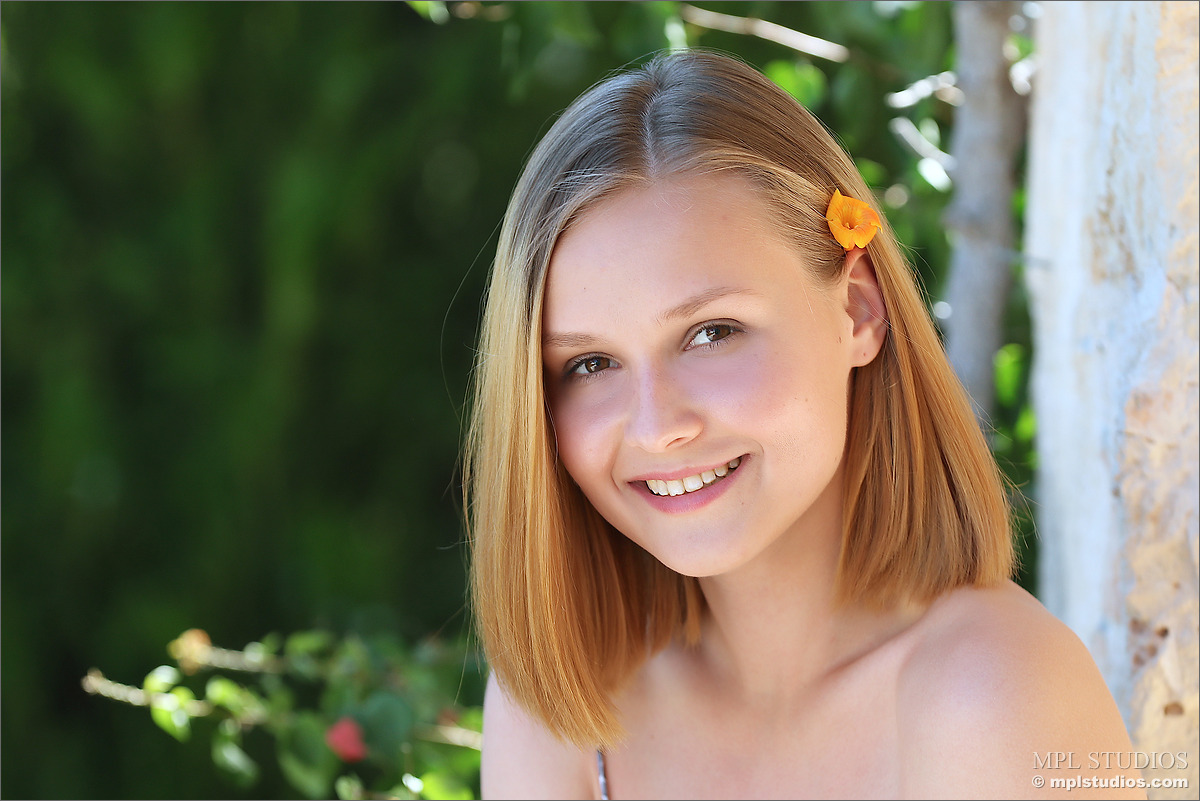 Photo #2 of Taya posing in Healthy Glow
