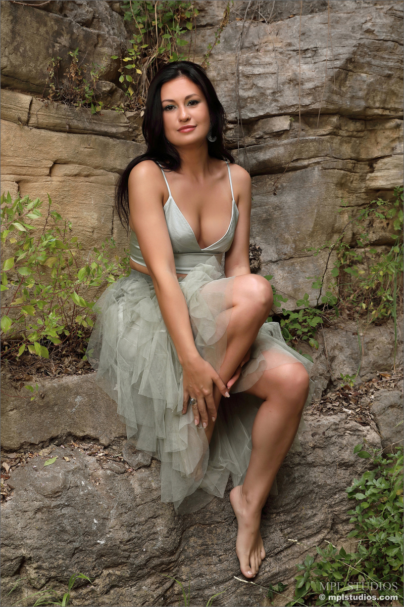 Photo #1 of Mila posing in Fortress of Solitude